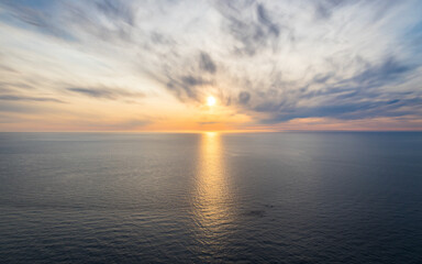 Midsummer sun over the barentsea. Beautiful ocean background. Tranquil scene.