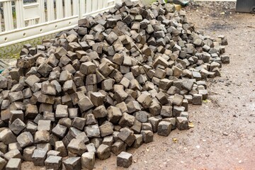 a lot of paving stones for road construction