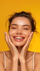 woman touching her skin with joy on a yellow background