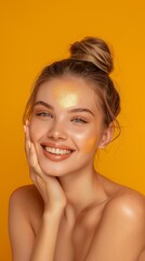Beautiful woman touching her skin with joy on a yellow background, showcasing a synchronized beauty routine