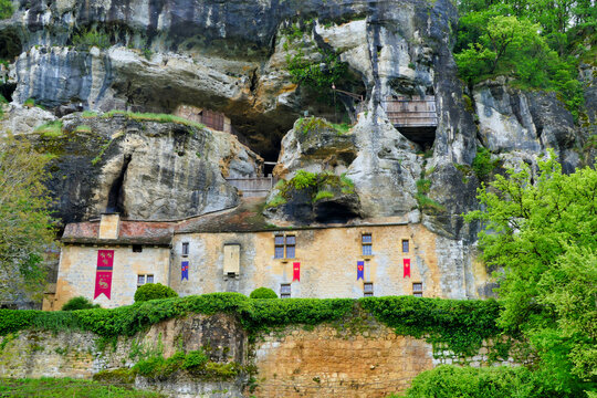 Maison forte de Reignac, an historical site of a fortified house built into the limestone cliffs in the Vezere valley of the Dordogne, France

