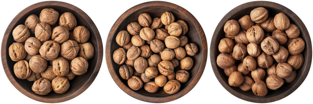 set of wallnuts in brown wooden bowl, cut out