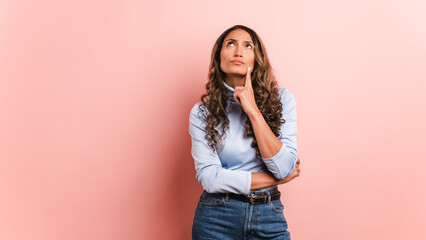 Hispanic woman looking around with thoughtful expression