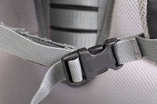 Black plastic clasp of backpack