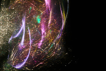 Long exposure photo of vibrant colours on a black background. Multicolored dynamic Light painting....