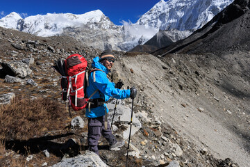 Sherpa mountain guide on his way to the camp Chukhung after crossing the Amphu Labtsa (aka Amphu...