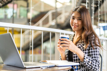 Young smiling asian woman happy relax use laptop conference work,learning, education, shopping, study online, webinar, online marketing, business, blog, digital internet advertising at home