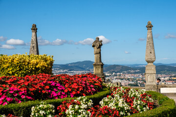 statues and flowers at Bom Jesus do Monte Sanctuary in Braga, Portugal