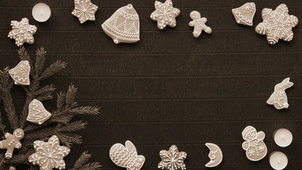 Festive Christmas Cookies And Decor, Sepia-Toned Display Of Holiday Treats And Pine