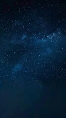 Obraz premium A breathtaking panorama of the Milky Way galaxy at night, showcasing the beauty of the cosmos