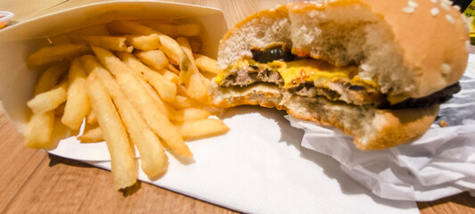 Fast food hamburgers can be eaten quickly.