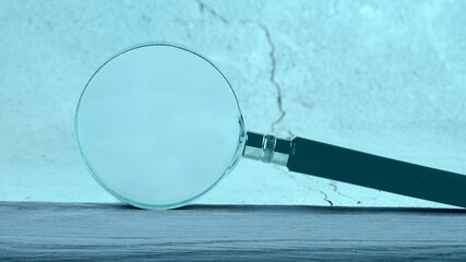 Magnifying glass isolated on abstract background