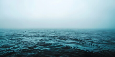 Fototapeta premium blue sea with waves and clouds , blue ocean with fog, nature background