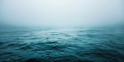 Obraz premium blue sea with waves and clouds , blue ocean with fog, nature background