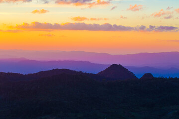 Sunset on the top of mountain tropical forest colourful sky cloud