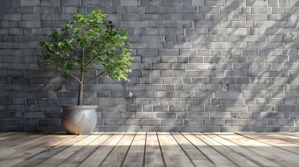 gray brick wall with wooden floor and small tree in a pot, with a wooden flooring background