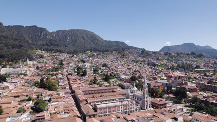 Santuario del Carmen's Intricate Spire Over Bogotá, Colombia - aerial	