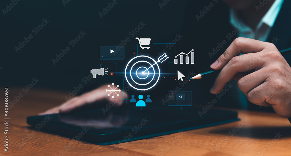 Poster target audience digital marketing concept with businessman pointing at graphical icons using tablet 