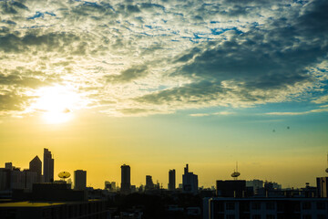 Sunset building with colorful sky cloud