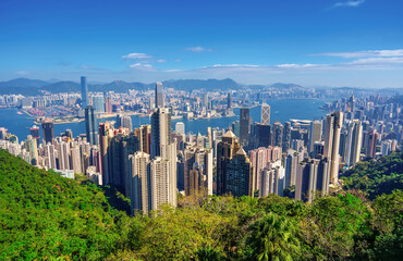Wonderful panoramic of Hong Kong city view from Victoria Peak, modern cityscape during sunny day in...