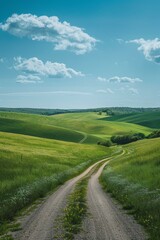Scenic view of a rural road through green hills