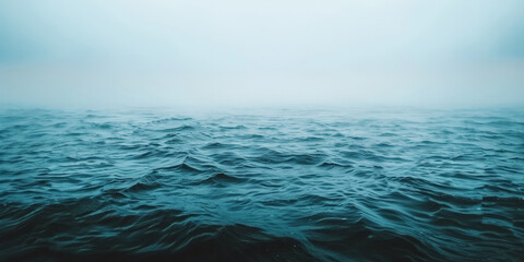 Fototapeta premium blue sea with waves and clouds , blue ocean with fog, nature background