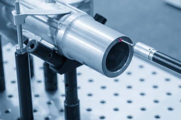 Fototapeta premium The quality control of automotive parts with multi axis Coordinate Measuring Machine.