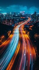 Fototapeta premium Long exposure of city traffic creating light trails that emphasize the geometry of the urban roads