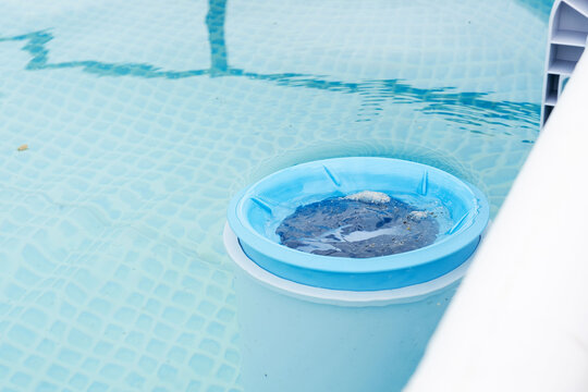 Close-up of the skimmer mounted on a frame pool