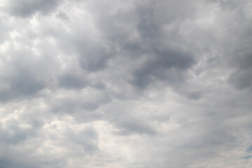 Unusual dark gray layered stratus clouds, skyscape.