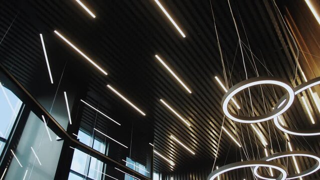 Ceiling fixture with multiple automotive lighting hanging in a pattern