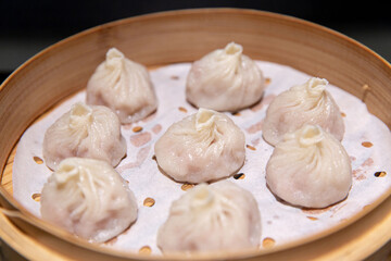 Savory Shanghai Xiaolongbao in Bamboo Steamer, the Essence of Chinese Dim Sum