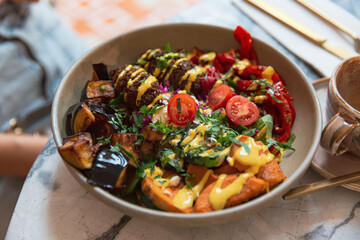 Exotic Kibbeh in a Roasted Vegetable Buddha Bowl with Pumpkin, Tomato, and Eggplant for a Gourmet Brunch