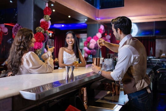 Bartender Preparing Cocktail at Upscale Bar
