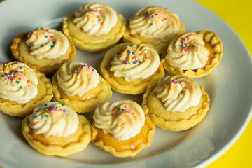 Group photo of homemade lemon meringues.