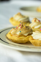 Group photo of homemade lemon meringues.