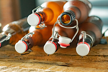 Brown beer bottles sealed with Bugel plugs: Craftsmanship in a cap.