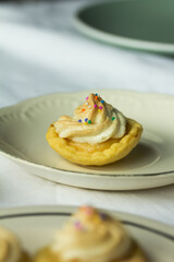 Group photo of homemade lemon meringues.