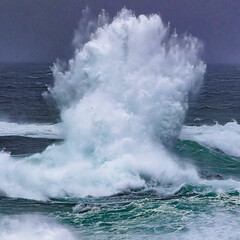 waves crashing on the rocks