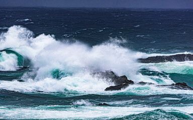 waves crashing on the rocks