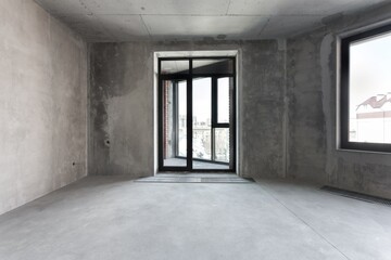 interior of the apartment without decoration in gray colors. rough finish