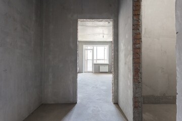 interior of the apartment without decoration in gray colors. rough finish