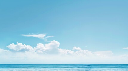 Obraz premium Serene Ocean and Blue Sky Background