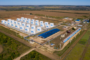 Aerial view of hydrogen storage hub under construction. Concept.
