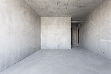 interior of the apartment without decoration in gray colors. rough finish