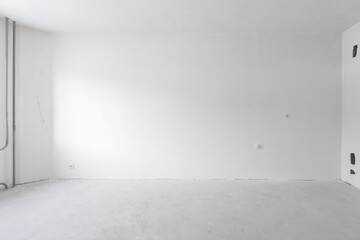 interior of the apartment without decoration in gray colors. rough finish