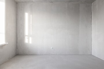 interior of the apartment without decoration in gray colors. rough finish
