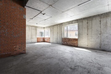 interior of the apartment without decoration in gray colors. rough finish