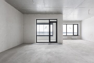 interior of the apartment without decoration in gray colors. rough finish
