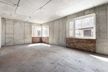 interior of the apartment without decoration in gray colors. rough finish